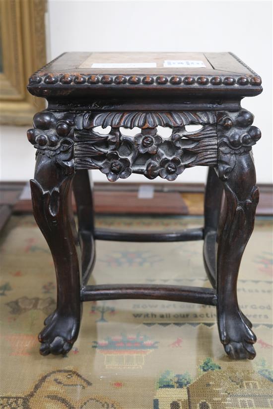 A small Chinese hardwood vase stand